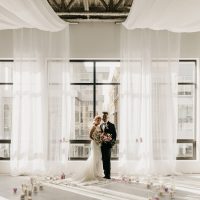 white wedding ceremony by Designer Weddings