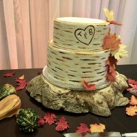 Wooden cake stand by Designer Weddings