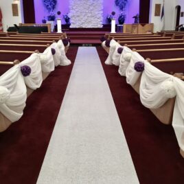 patterned aisle runner by Designer Weddings