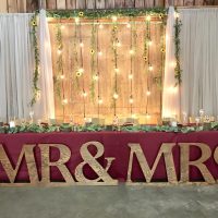 rustic  backdrop by Designer Weddings